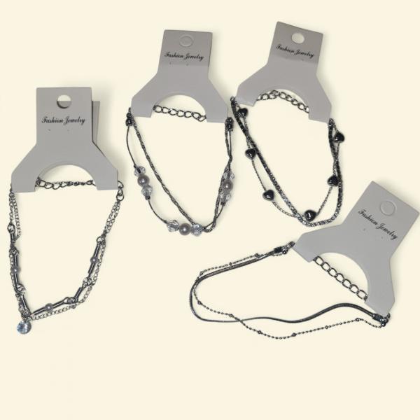 PULSERA FINA DOBLE SUIRTIDA X UNID